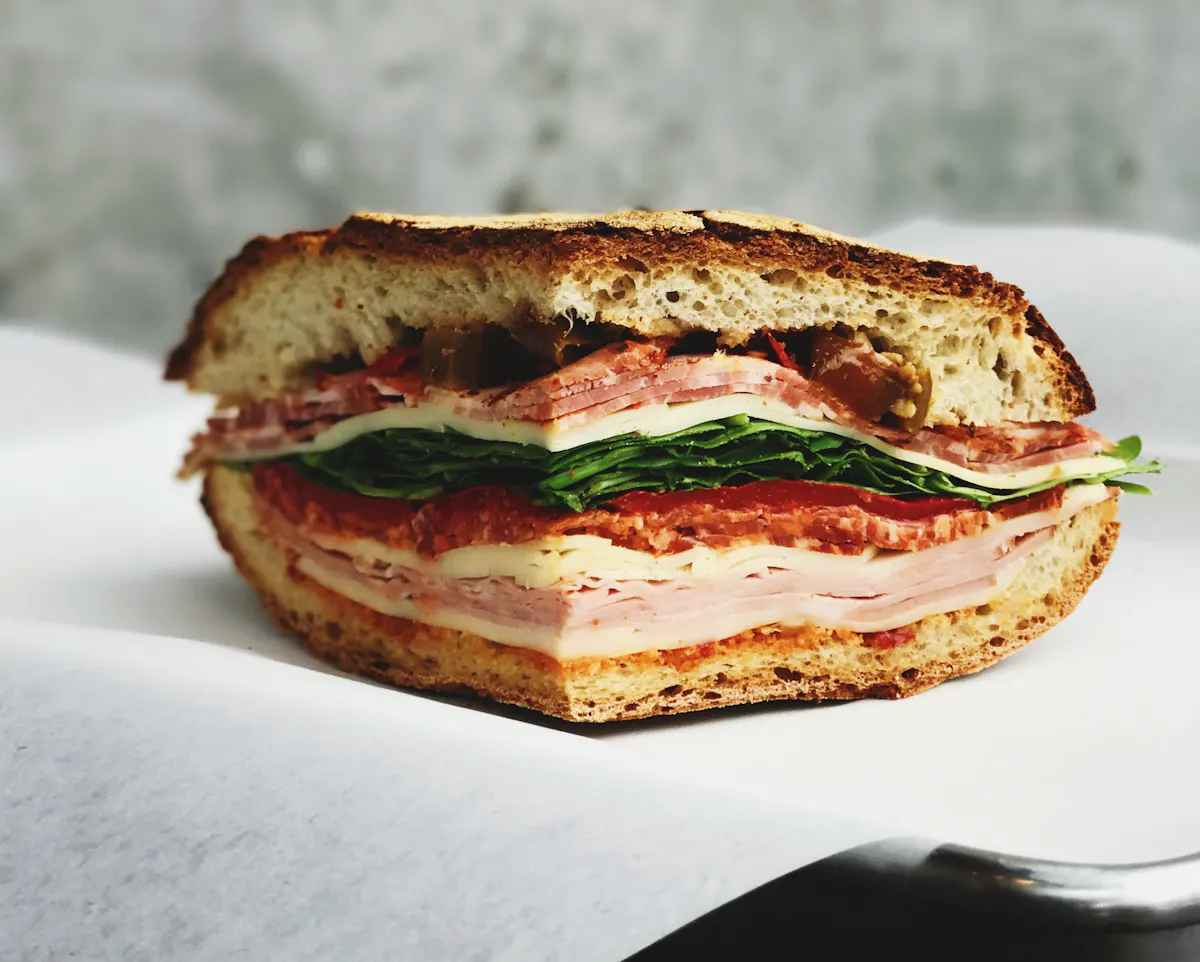 a sandwich cut in half on a plate